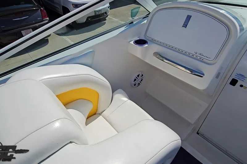 Slide: The Image of Interior of a 2001 Powerquest 280 Silencer boat with white and yellow seating. - 48