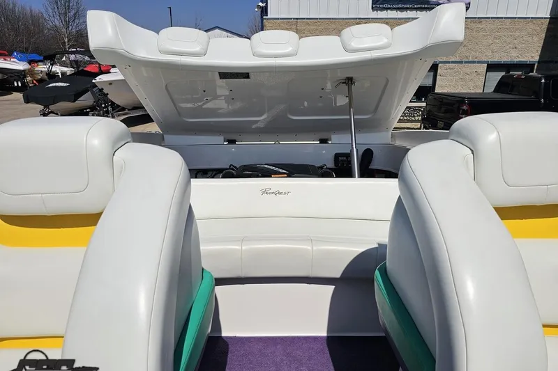 Slide: The Image of 2001 Powerquest 280 Silencer boat interior with open engine compartment. - 75
