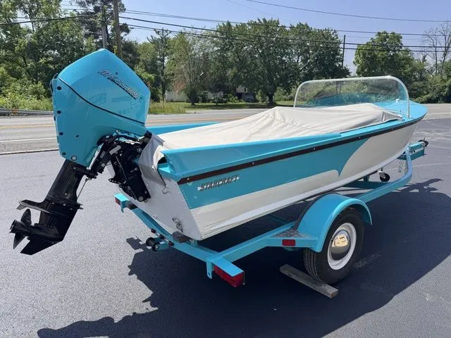 Slide: The Image of Starcraft 57 Ski Champ Includes 25hp and Trailer 2025 - 25