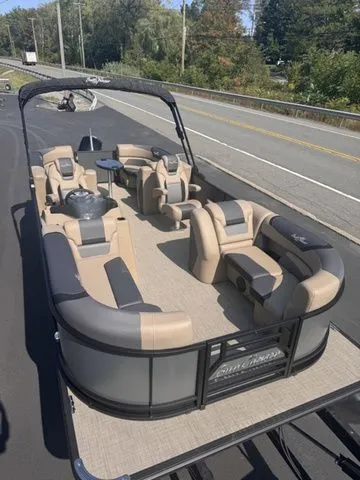 Slide: The Image of SunChaser Geneva Sport 23 LR DH Tri-Toon w/150 and Trailer 2026 - 2