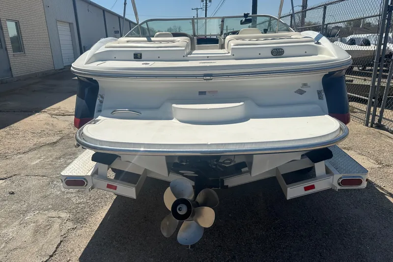 Slide: The Image of Rear view of a 2006 Cobalt 220S boat with propeller and swim platform. - 19