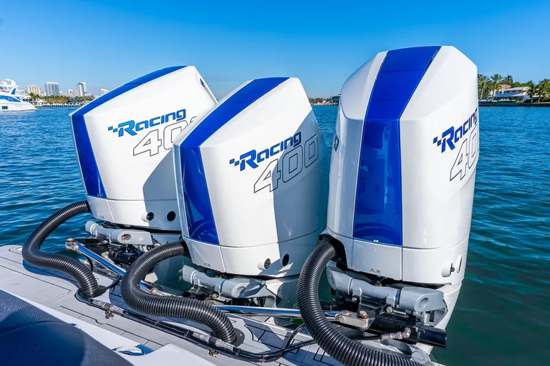 Slide: The Image of Triple Racing 400 outboard engines on 2026 Nor-Tech 390 Sport Center Console boat. - 32