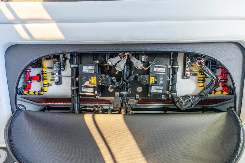Slide: The Image of Electrical panel of 2026 Nor-Tech 390 Sport Center Console boat, showcasing wiring and components. - 46