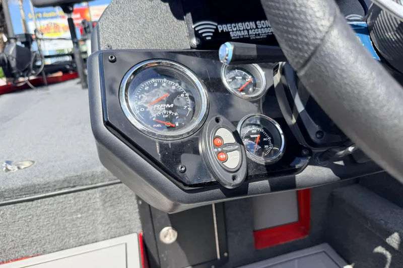 Slide: The Image of Dashboard of a 2023 Avid 20 XB boat with gauges and controls. - 10