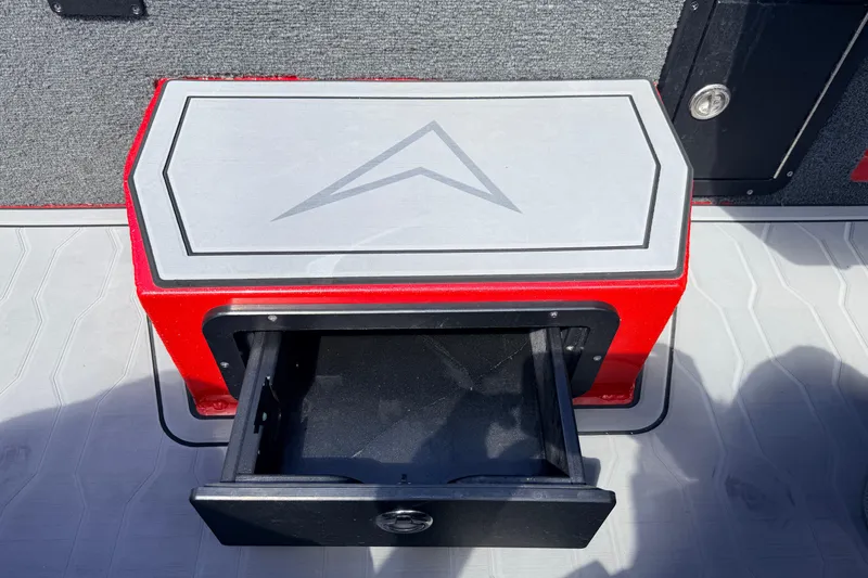 Slide: The Image of Red storage compartment with open drawer on 2023 Avid 20 XB boat. - 13