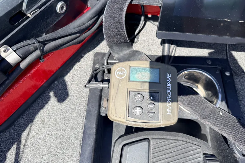 Slide: The Image of Hydrowave device on 2023 Avid 20 XB boat, featuring control panel and cables. - 27