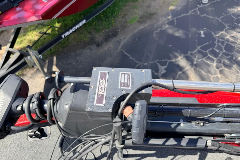 Slide: The Image of 2023 Avid 20 XB boat control panel with cables and handle. - 31