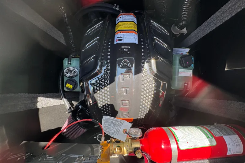 Slide: The Image of Engine compartment of 2026 Supra SE 550 with visible Raptor engine and fire extinguisher. - 20