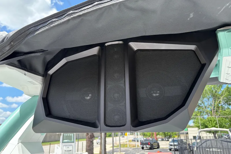 Slide: The Image of 2026 Supra SE 550 boat speakers under canopy, showcasing modern audio design. - 31