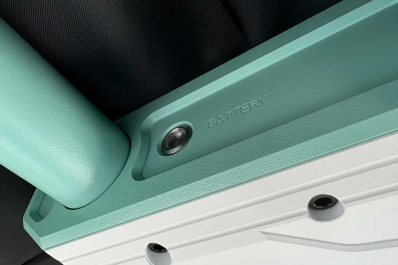Slide: The Image of Close-up of 2026 Supra SE 550 battery compartment with teal and gray components. - 35