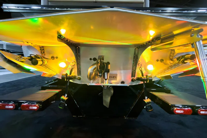 Slide: The Image of Rear view of 2026 Montara Surf Boss EVO SLDH 25' with illuminated components. - 13