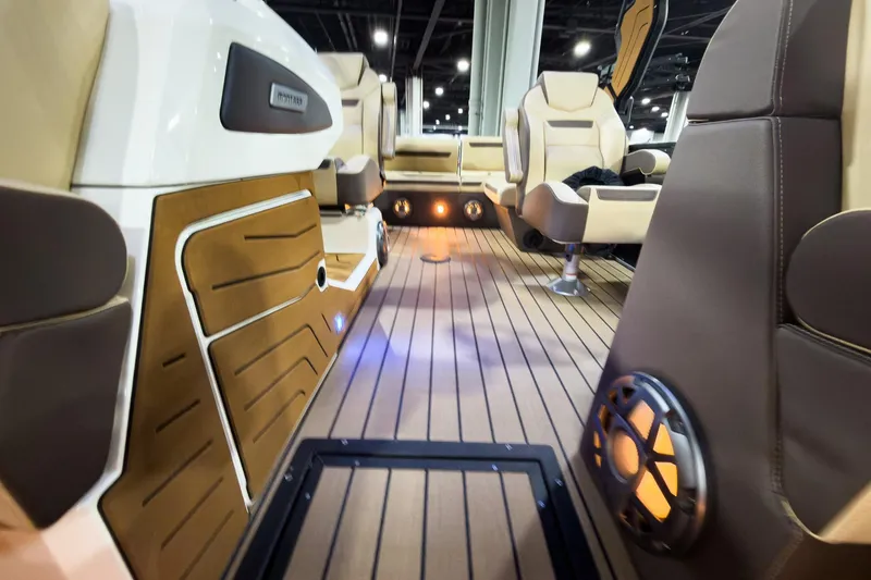 Slide: The Image of Luxurious interior of 2026 Montara Surf Boss EVO SLDH 25' boat with elegant seating. - 24