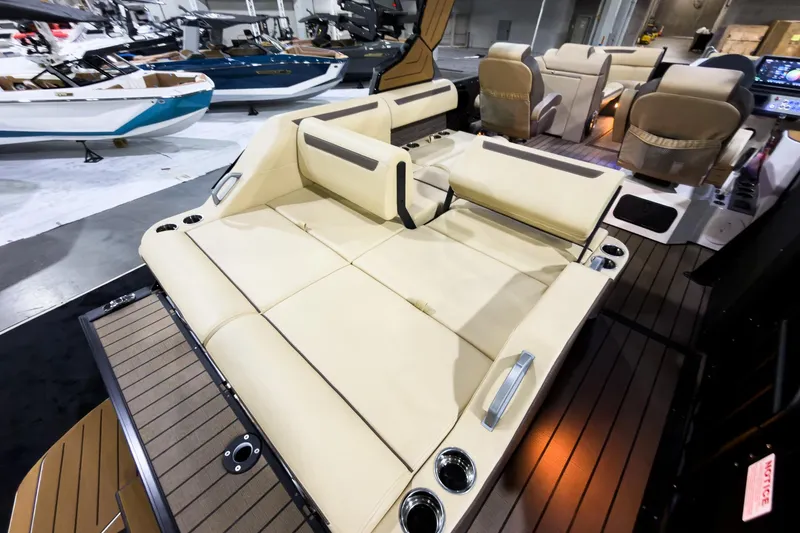 Slide: The Image of 2026 Montara Surf Boss EVO 25' luxury boat interior with beige seating and modern design. - 28