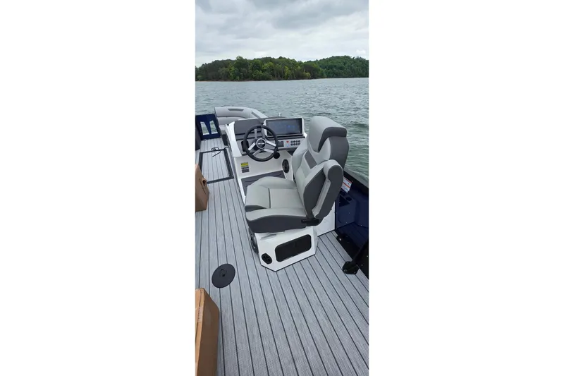 Slide: The Image of 2026 Montara Surf Boss EVO - SLDH 25' boat interior with modern helm and seating. - 5