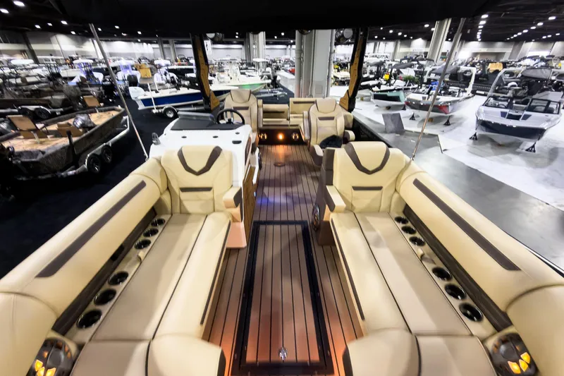 Slide: The Image of Luxurious 2026 Montara Surf Boss EVO boat interior at a boat show. - 9