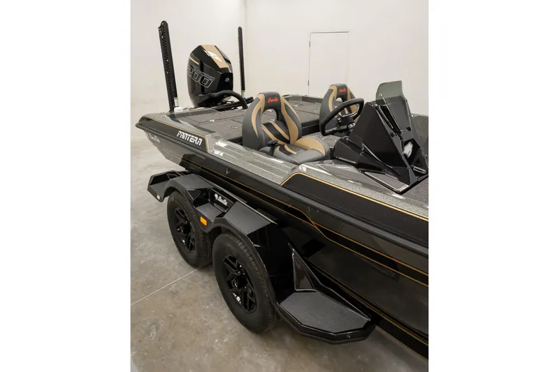 Slide: The Image of 2027 Bass Cat Pantera boat with sleek design and dual seats in a showroom. - 6