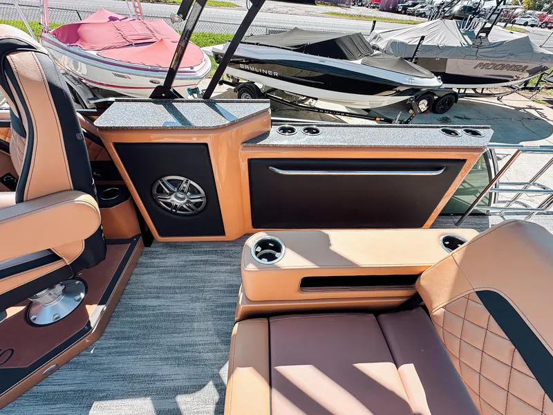 Slide: The Image of 2025 Godfrey AquaPatio 23' Flip Lounge Tritoon interior with luxurious seating and modern design. - 14