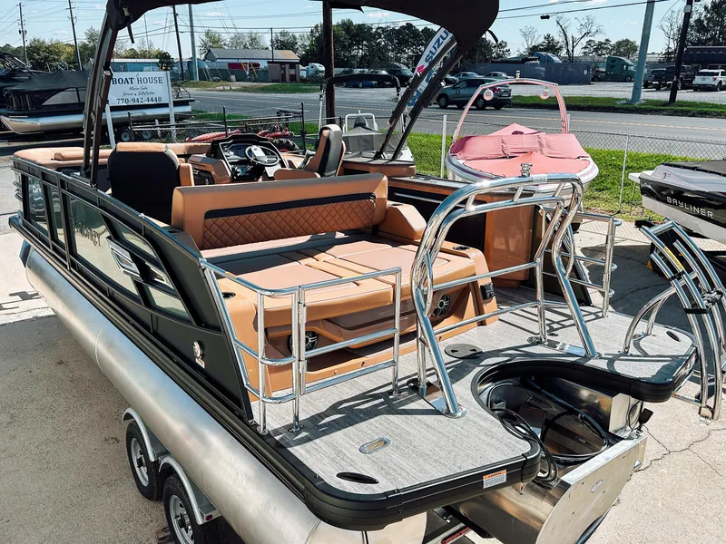 Slide: The Image of 2025 Godfrey AquaPatio 23' Flip Lounge Tritoon with sleek design and luxurious seating. - 4