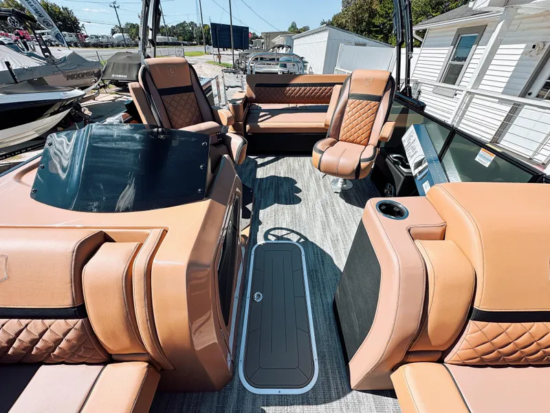 Slide: The Image of Luxurious 2025 Godfrey AquaPatio 23' Flip Lounge Tritoon with elegant seating and modern design. - 8