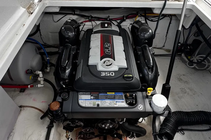 Slide: The Image of Engine compartment of 2022 Monterey 295 Sport Yacht with Mercury 6.2L 350 engine. - 20