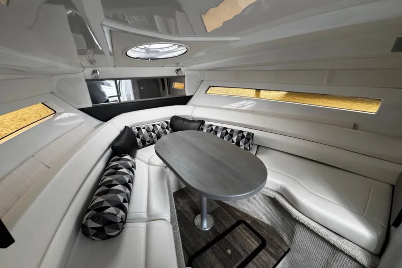 Slide: The Image of Interior of 2022 Monterey 295 Sport Yacht with elegant seating and modern design. - 26