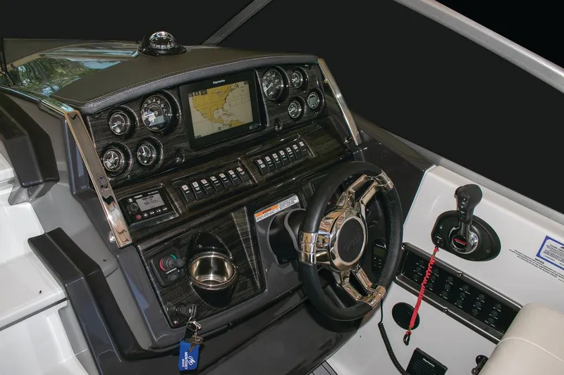 Slide: The Image of Manufacturer Provided Image: 2022 Monterey 295SS Super Sport dashboard with navigation system and controls. - 2