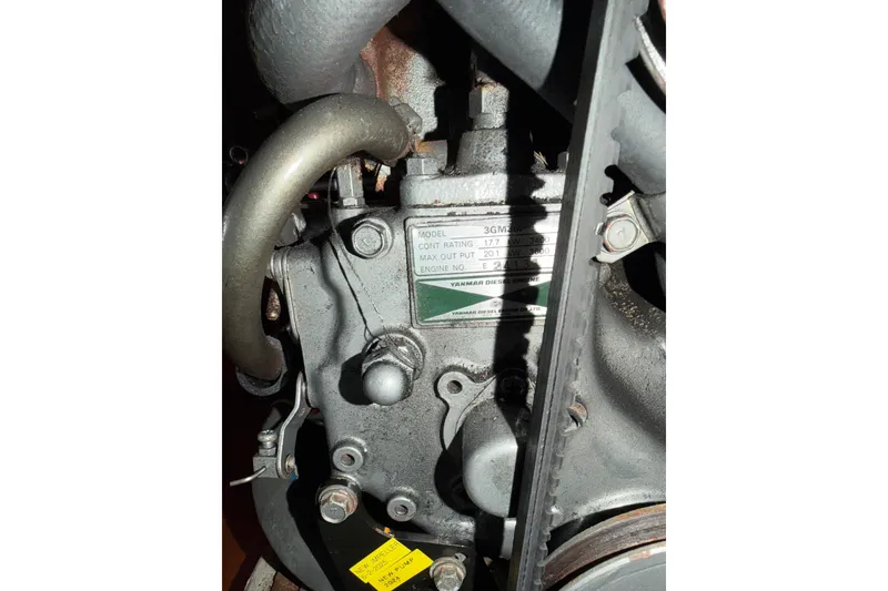 Slide: The Image of Close-up of a Yanmar diesel engine in a 2000 Tartan 3500 sailboat. - 22