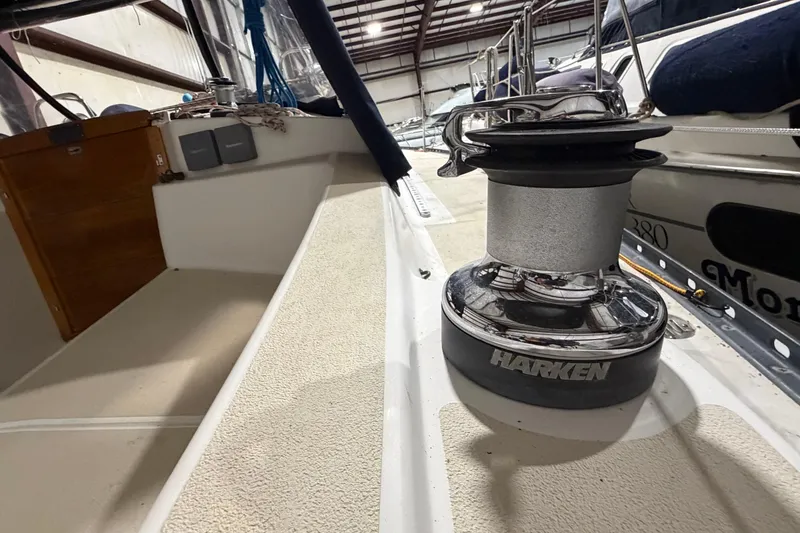 Slide: The Image of Tartan 3500 sailboat deck with Harken winch, 2000 model, in storage facility. - 35