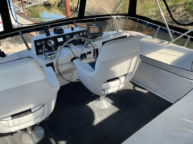 Slide: The Image of Interior of 1990 Ocean Alexander 440 Sundeck CPMY with helm station. - 20