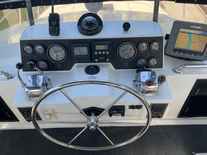 Slide: The Image of 1990 Ocean Alexander 440 Sundeck CPMY helm console. - 21