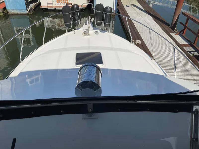 Slide: The Image of Foredeck of 1990 Ocean Alexander 440 Sundeck CPMY in harbor. - 23