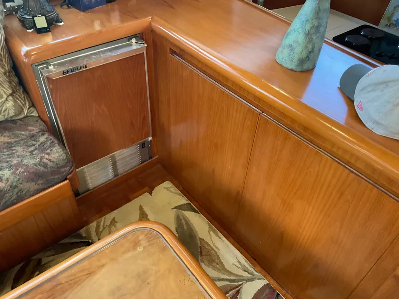 Slide: The Image of Interior of 1990 Ocean Alexander 440 Sundeck CPMY with wooden furnishings. - 29