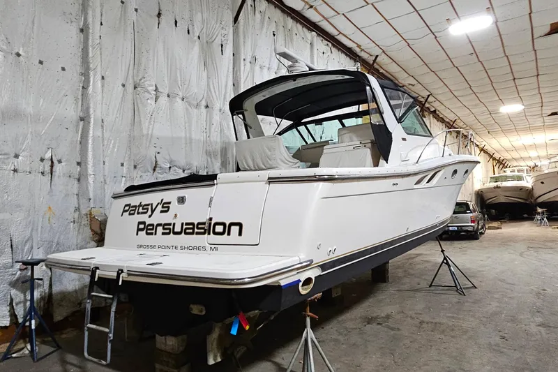 Slide: The Image of 2000 Tiara Yachts 3500 Open in storage, labeled "Patsy's Persuasion," Grosse Pointe Shores, MI. - 21