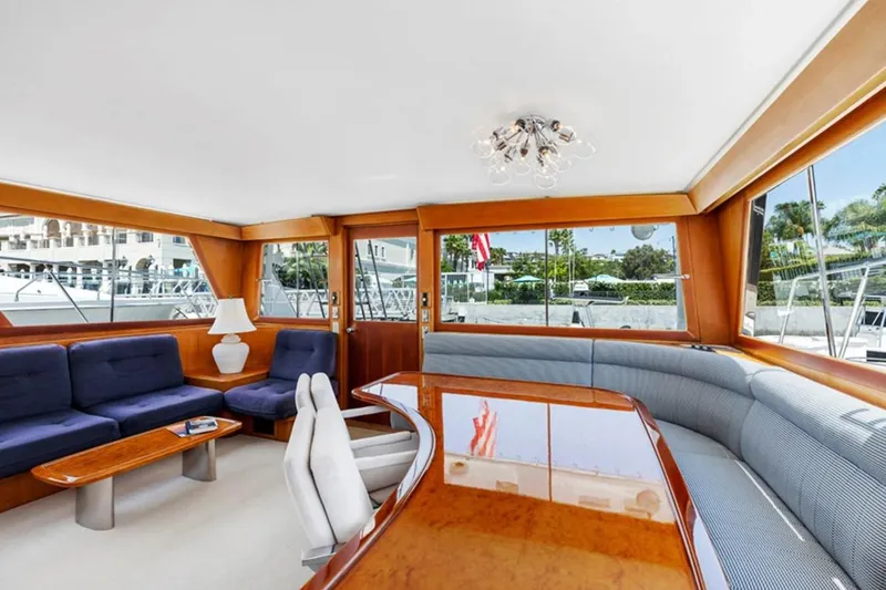 Slide: The Image of Luxurious interior of a 1983 Elliott Yacht Fisher, featuring elegant seating and wooden accents. - 13