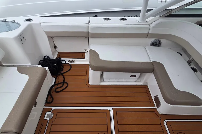 Slide: The Image of 2023 Robalo R317 Dual Console boat controls and dashboard close-up. - 11