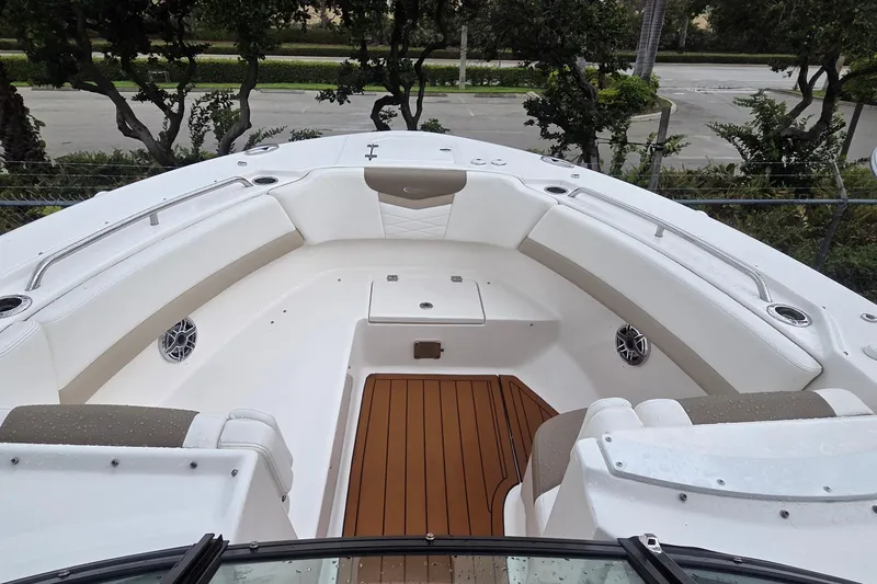 Slide: The Image of 2023 Robalo R317 Dual Console boat with identification plate "ROBH0164F323". - 17