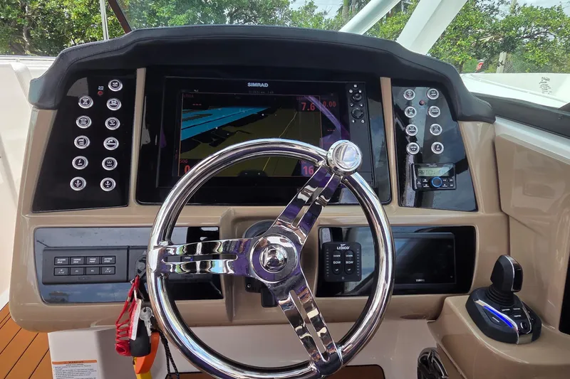 Slide: The Image of Simrad marine electronics in 2023 Robalo R317 Dual Console boat. - 34