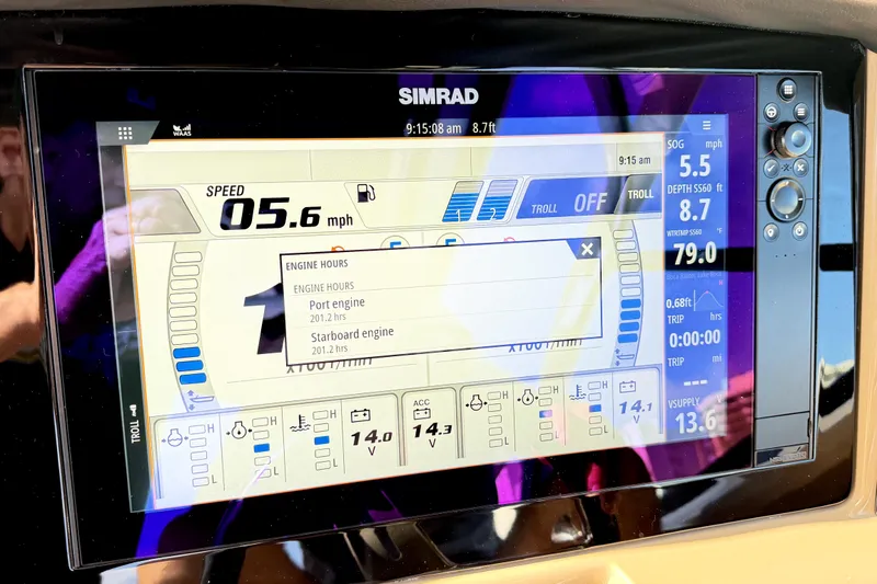 Slide: The Image of Simrad display on 2023 Robalo R317 Dual Console showing speed and engine hours. - 5