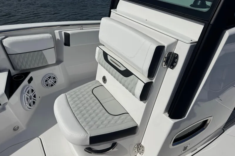 Slide: The Image of 2025 Blackfin 252 CC boat interior with luxurious seating and modern design. - 27