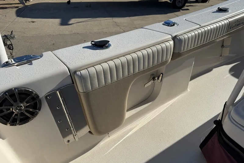 Slide: The Image of 2019 Sea Chaser 24 HFC boat interior with cushioned seating and speaker. - 14