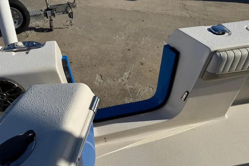 Slide: The Image of 2019 Sea Chaser 24 HFC boat interior with seating and storage compartments. - 15