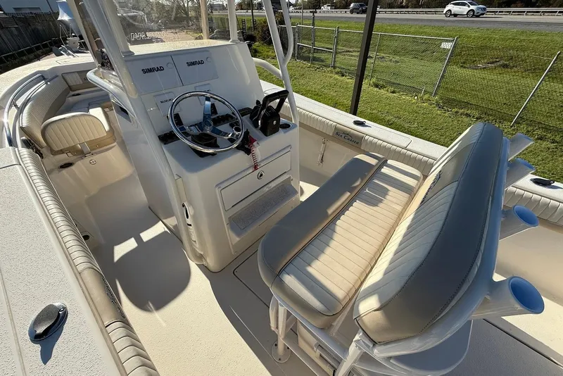 Slide: The Image of 2019 Sea Chaser 24 HFC boat interior with steering console and seating. - 17