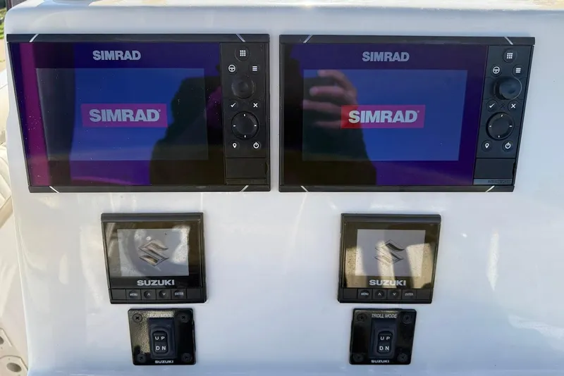 Slide: The Image of Simrad navigation displays on 2019 Sea Chaser 24 HFC boat dashboard. - 20