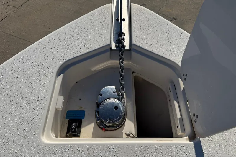 Slide: The Image of Anchor compartment of 2019 Sea Chaser 24 HFC boat with chain and winch. - 28