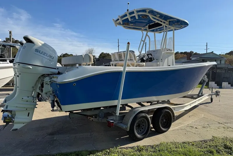 Slide: The Image of 2019 Sea Chaser 24 HFC boat with Suzuki engine on trailer, side view. - 8