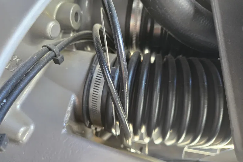 Slide: The Image of Close-up of 2016 Cobalt R3 engine components with hoses and clamps. - 11