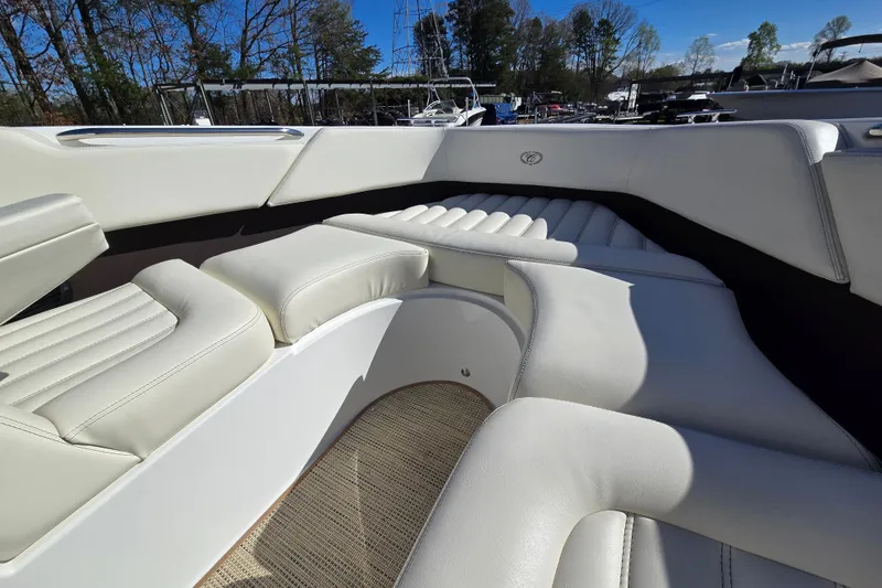 Slide: The Image of Luxurious interior of a 2016 Cobalt R3 boat with white leather seating. - 22