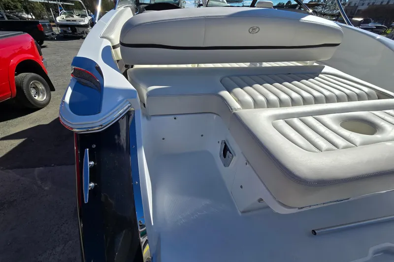 Slide: The Image of 2016 Cobalt R3 boat with white leather seating and sleek design. - 27