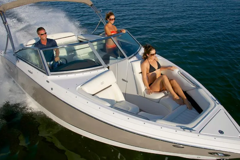 Slide: The Image of Manufacturer Provided Image: 2016 Cobalt R3 boat cruising with passengers on a sunny day. - 62
