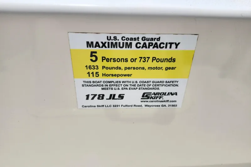 Slide: The Image of 2022 Carolina Skiff 178 JLS capacity label: 5 persons, 737 pounds, 115 horsepower. - 19